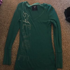 Long sleeve AE shirt color is turquoise